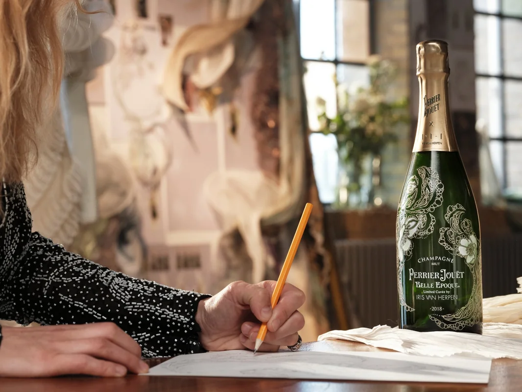 Iris van Herpen shaping silk and golden metal in her atelier