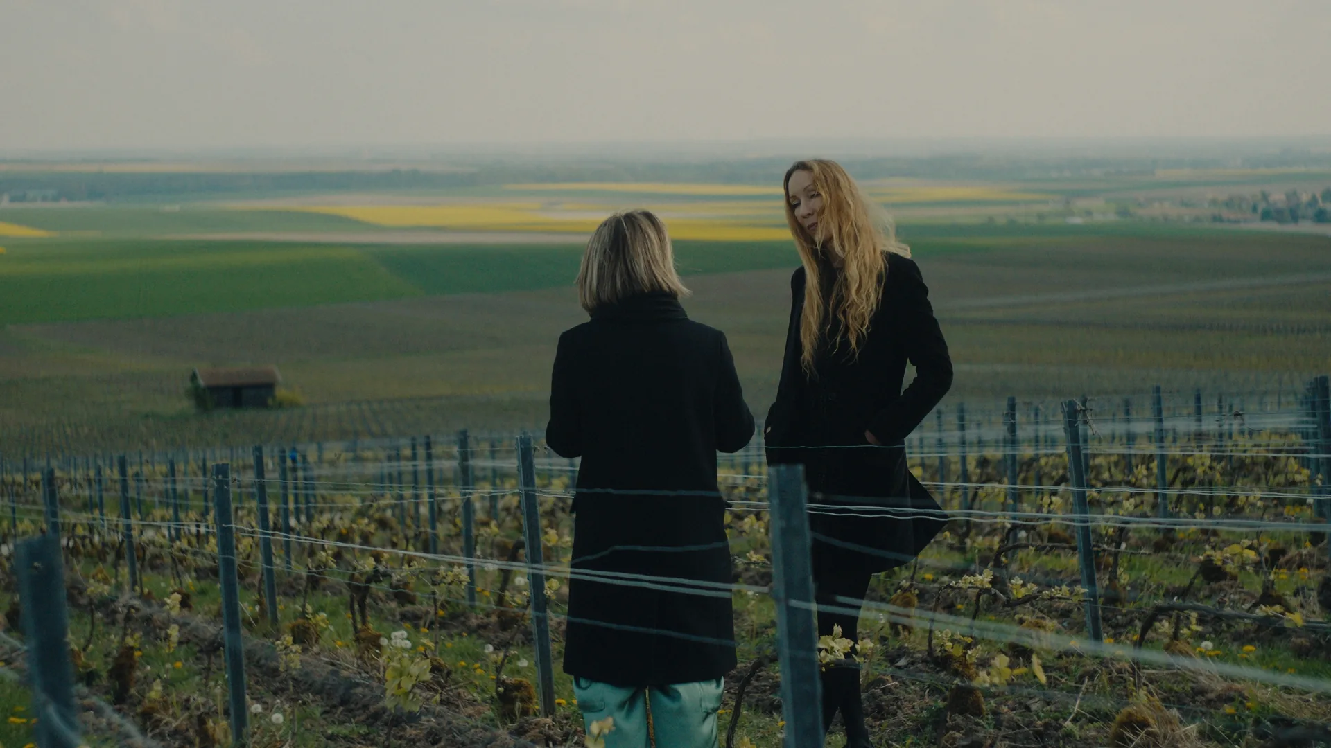 Iris van Herpen and Cellar Master Séverine Frerson in the Perrier-Jouët vineyards overlooking the Champagne landscape